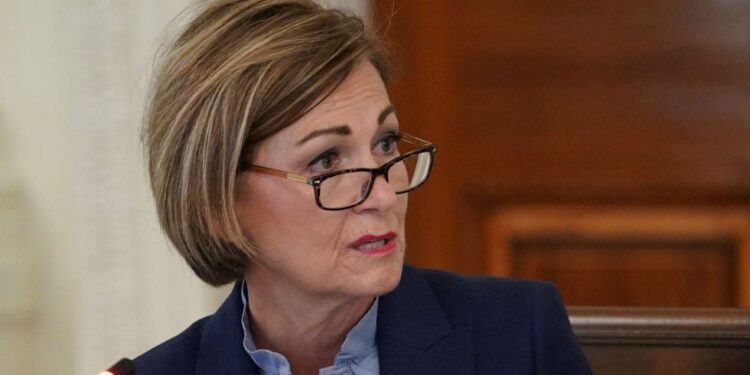 Iowa governor reverses course, issues statewide mask mandate