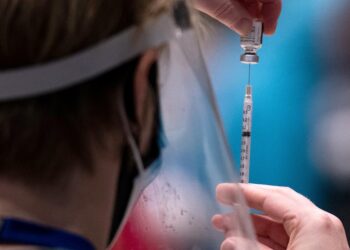 US Coronavirus: ‘Healthy, young’ Americans will likely get Covid-19 vaccine in mid- to late summer, expert says